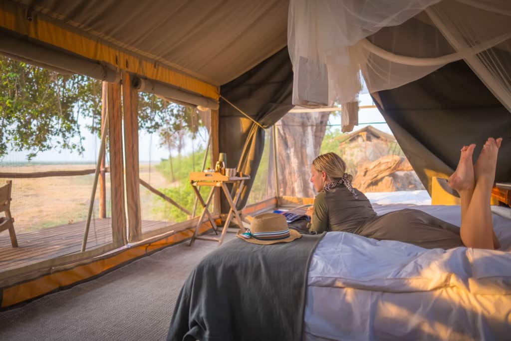 Natasha Lies On Bed On Safari - Linyanti