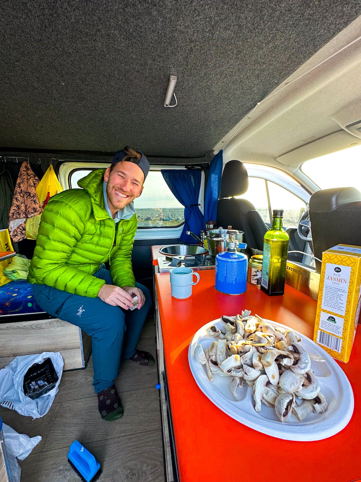 Cameron Cooking In Campervan Rental
