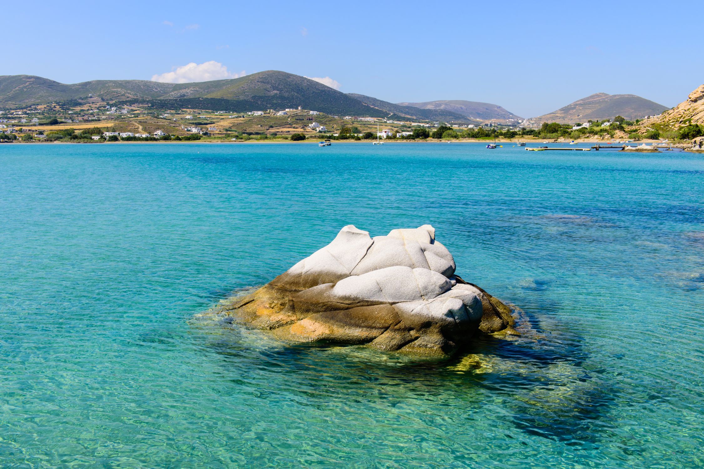 A Rock In The Water At Kolympethres Beach