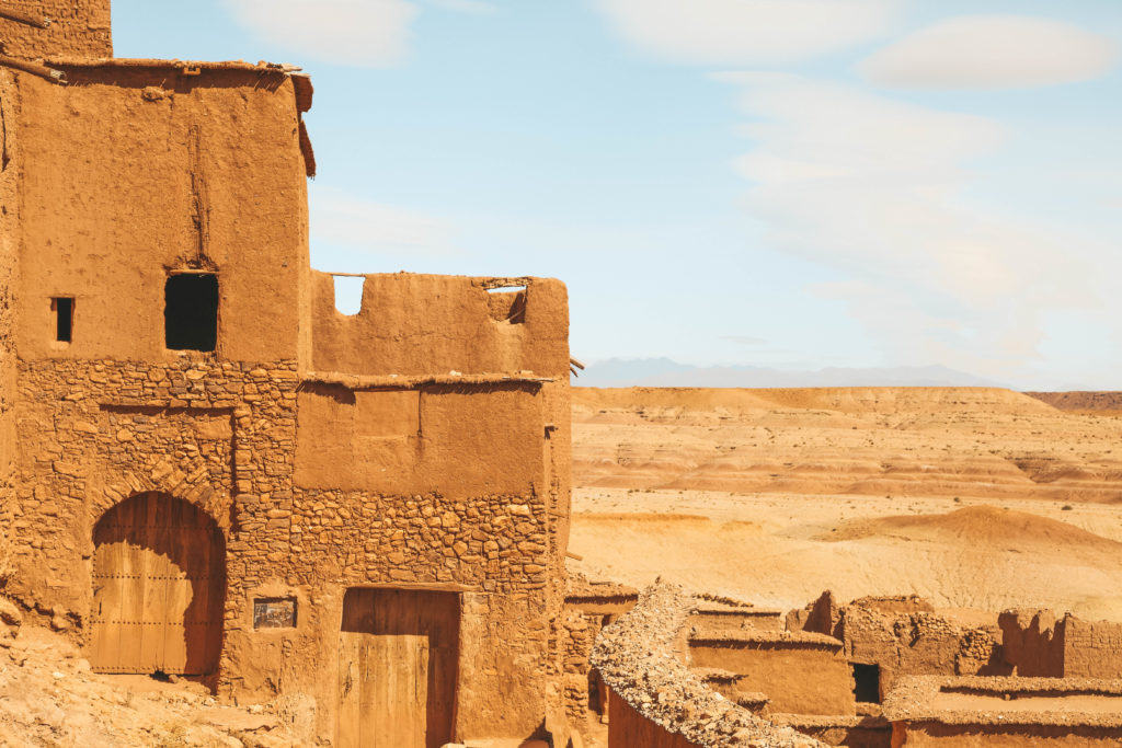 Morocco Mud Brick Buildings In Desert