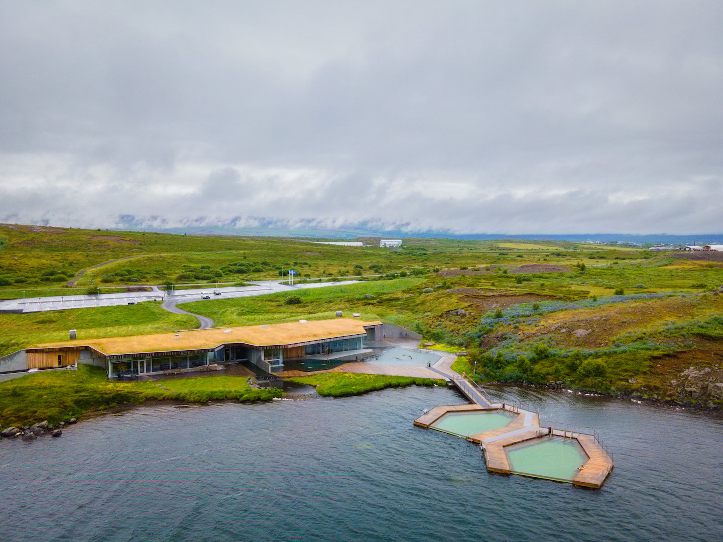 Vök Hot Spring Baths From A Drone In Early Morning Light