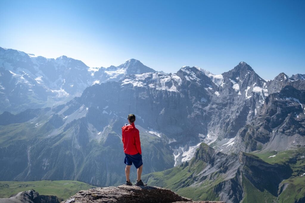 Cameron On Top Of Mountain In Switzerland